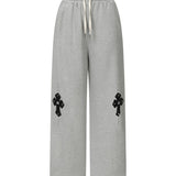 MUCENT/ムセント CROSS LEATHER PATCH SWEAT PANTS
