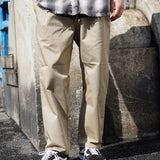 UNIVERSAL OVERALL TUCK TAPERED PANTS