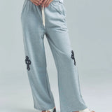 MUCENT/ムセント CROSS LEATHER PATCH SWEAT PANTS