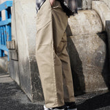 UNIVERSAL OVERALL TUCK TAPERED PANTS