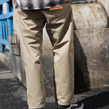 UNIVERSAL OVERALL TUCK TAPERED PANTS