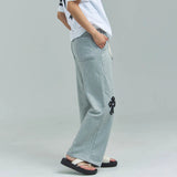 MUCENT/ムセント CROSS LEATHER PATCH SWEAT PANTS