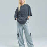 MUCENT/ムセント CROSS LEATHER PATCH SWEAT PANTS